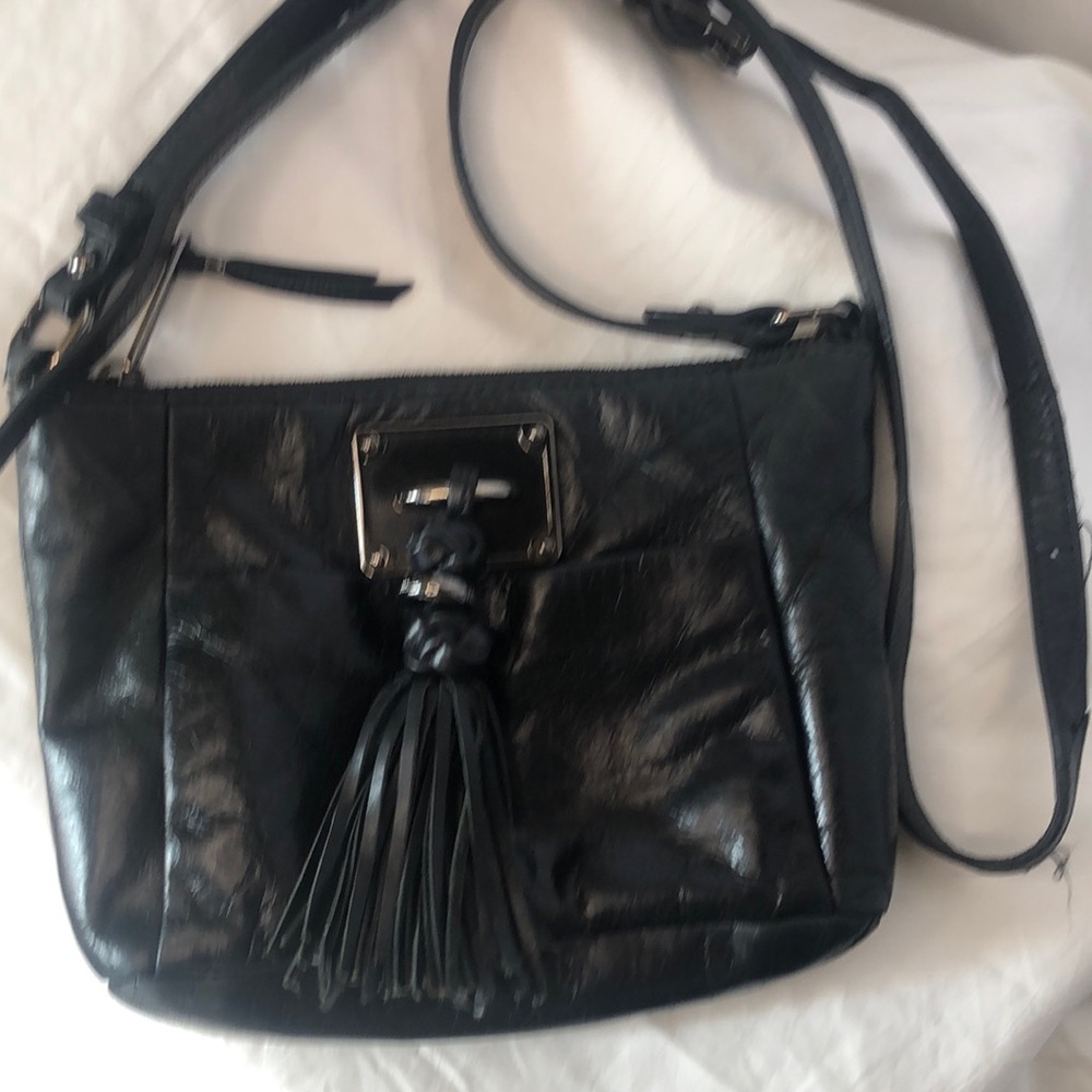 ELLIOT LUCCA black buttery soft 100% leather crossbody. Black tassels in front.